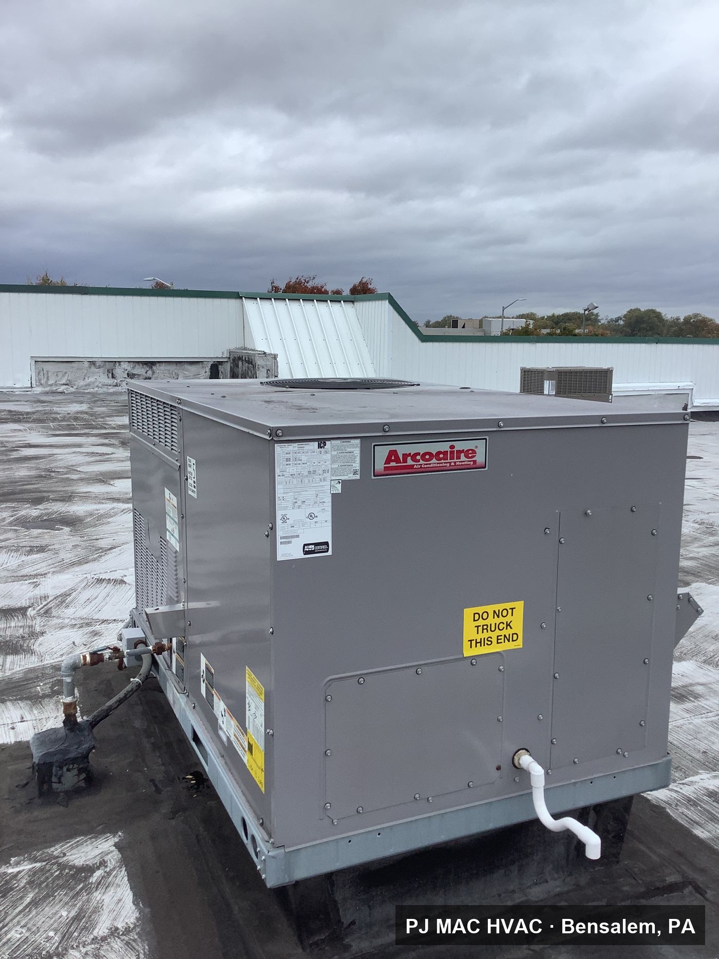 A new Arcoaire packaged rooftop unit installed by PJ MAC HVAC at a commercial property.