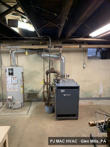PJ MAC HVAC completed this gas boiler installation with new copper piping in a basement.